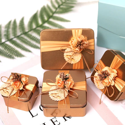 Wholesale Recyclable Luxury Gold Packaging Chocolate Candy Wedding Heart Shaped Tin Candle Gift Box with Ribbon and Flower