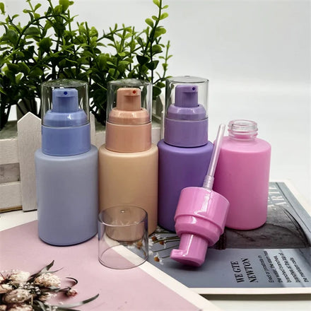 Round Shape Pink Cosmetic Foundation Glass Bottle 30ml Essential Oil Serum Glass Bottles with Transparency Pump Cap