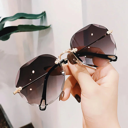 Luxury Fashion Rimless Sunglasses Shade Metal Frame Women Custom logo Unique Design Sunglasses