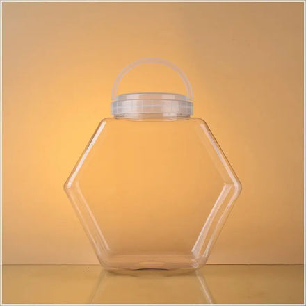 Customized Logo Factory 30 Ounces 850ml 1500ml Plastic Hexagonal Pet Fishbowl Candy Jar with White Cap for Chocolate Chewing Gum