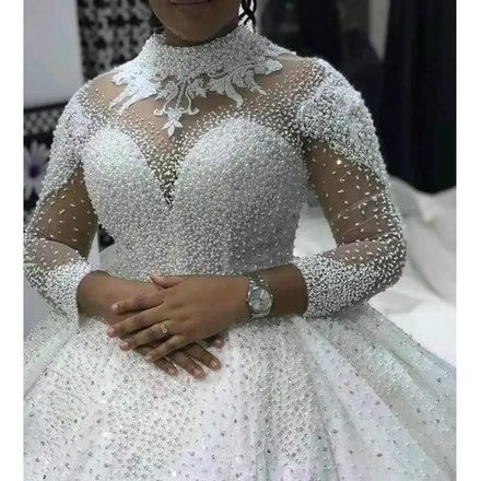 2022 Luxury Heavy Pearls Beaded Wedding Dresses Long Sleeves High Neck Bling Bling Ball Gown Plus Size African Wedding Dress