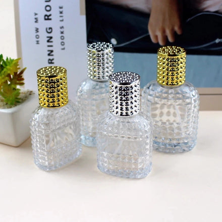 Free Sample 50ml Luxury Carved Glass Perfume Bottle with Sprayer Round Spray Bottle