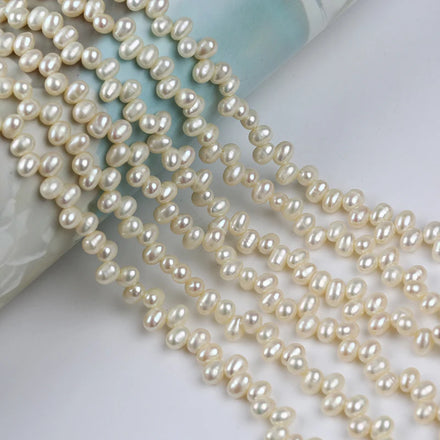 Zhuji Wholesale 5-6mm Yellow Color Top Hole Rice Freshwater Pearl Strands