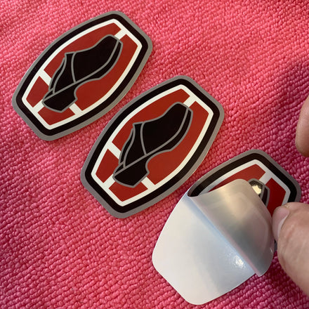 China Wholesale Adhesive Vinyl Sticker Label for ClothingWaterproof Cute Logo PVC Plastic Sticker for Car