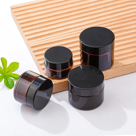 Wholesale 20g 30g 50g Amber Glass Jar Cosmetics Empty Body Face Cream Glass Jar with Black Lid