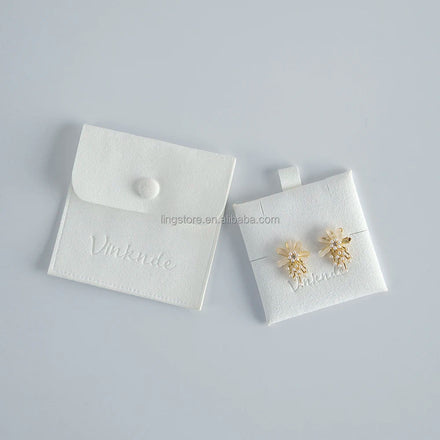 Deboss Printed Luxury White Jewelry Packaging Bag Pouch Stamped Button Insert Pad Beautifully Designed for Fashionable Women