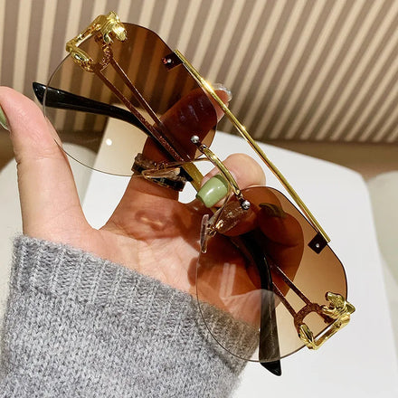New Trendy Vintage Rimless Metal Sunglasses Luxury Leopard Oversized Sunglasses Men 2024