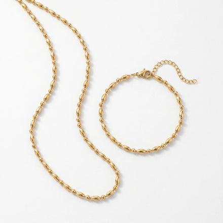 QIAOREN 11632 Waterproof 18K Gold Plated Stainless Steel Rice Bead Jewelry Set Necklace Bracelet Daily Wear
