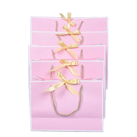 Boutique Reusable Pink Luxury Jewelry Gift Shopping Paperboard Bags with Ribbon Handles and Bow Tie Recycled Materials